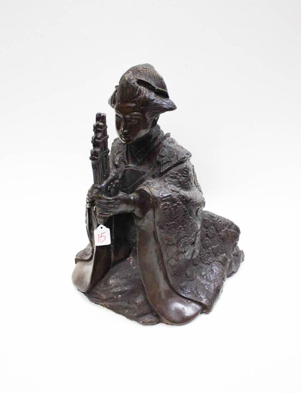 Appraisal: JAPANESE BRONZE FIGURAL SCULPTURE depicting a seated woman musician with