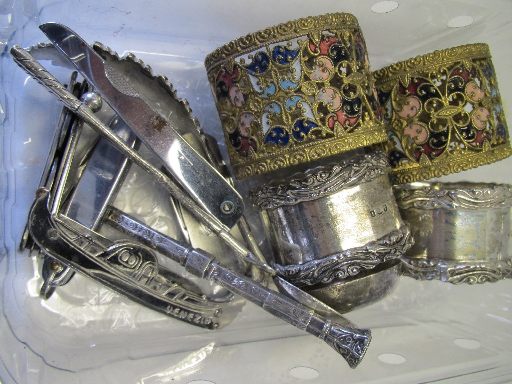 Appraisal: Lot comprising silver napkin rings enamelled napkin rings etc