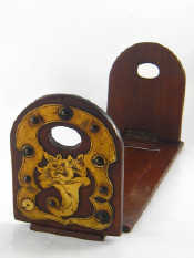 Appraisal: A Mahogany book slide with stud mounted brass decoration AF