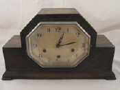 Appraisal: An oak cased Art Deco day chiming mantel clock ht