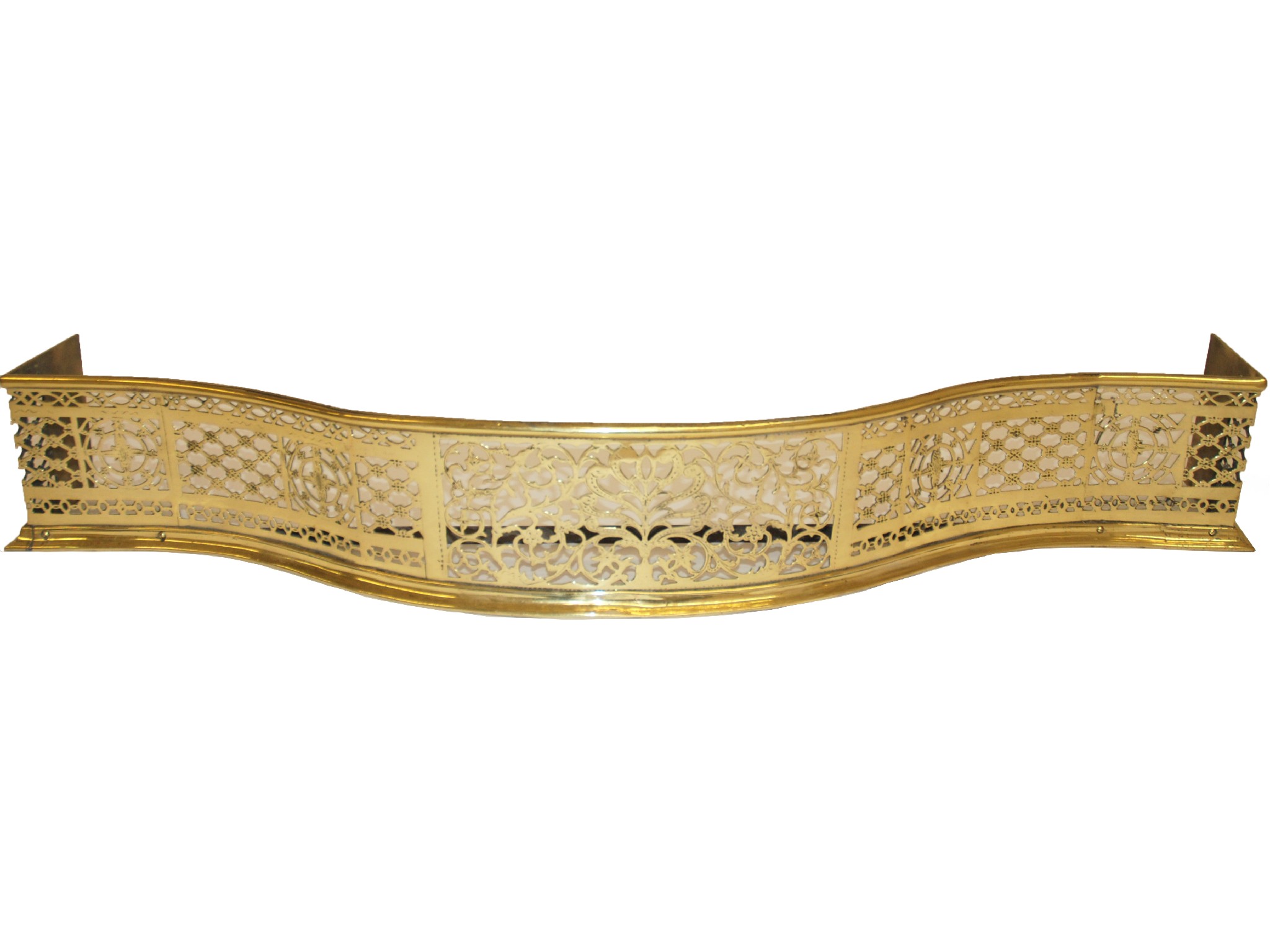 Appraisal: A George III brass serpentine fenderpierced with scrolling foliage and