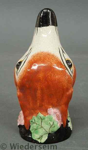 Appraisal: English Staffordshire fox head stirrup cup c h