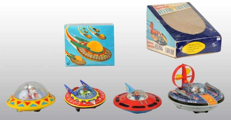 Appraisal: Lot of Plastic Tin Space Saucer Toys Description Includes one