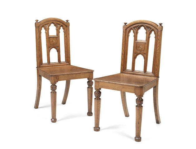 Appraisal: A pair of early Victorian Gothic Revival oak hall chairs