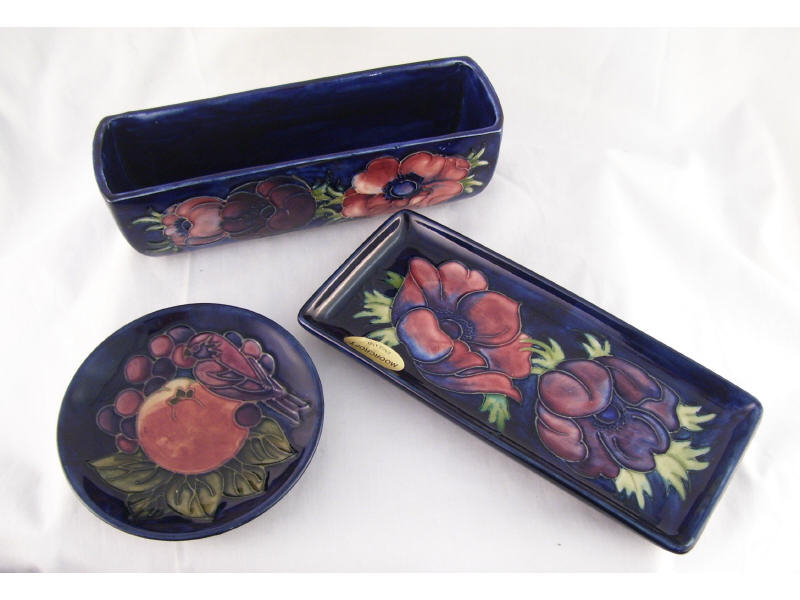 Appraisal: pc Moorcroft Pottery Lot Lot includes Rectangular bowl with a