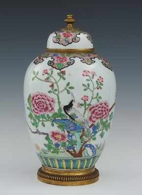 Appraisal: A Porcelain and Ormolu Lidded Jar Chinese Of oblong form