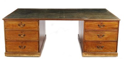 Appraisal: A large mahogany twin pedestal partner's desk the rectangular moulded