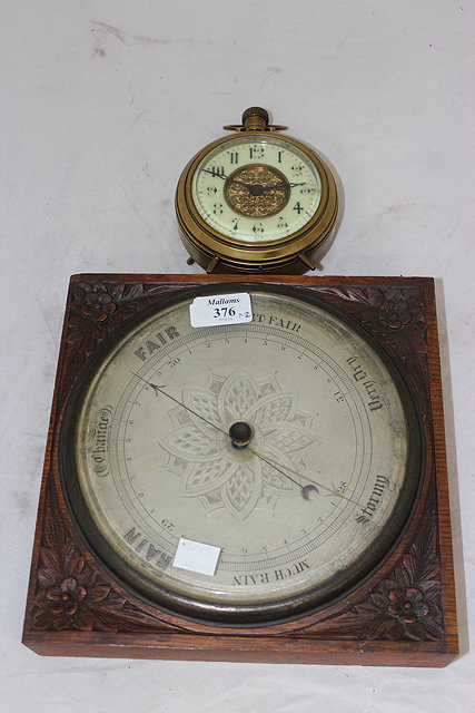 Appraisal: AN EARLY TH CENTURY ANEROID BAROMETER with silvered dial and