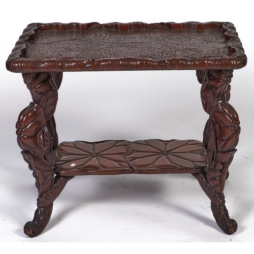 Appraisal: A Japanese naturalistically carved and stained softwood table Taisho period