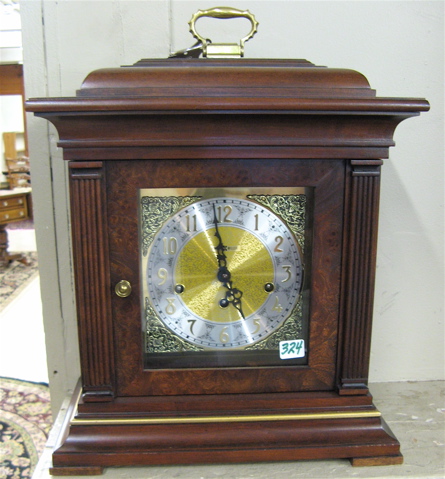 Appraisal: A MAHOGANY CASED BRACKET CLOCK Howard Miller Clock Co Thomas