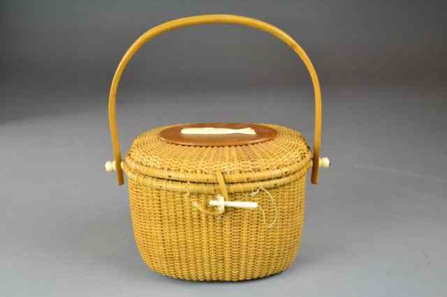 Appraisal: NANTUCKET BASKET PURSE W OXBONE WHALEVery nice woven purse with