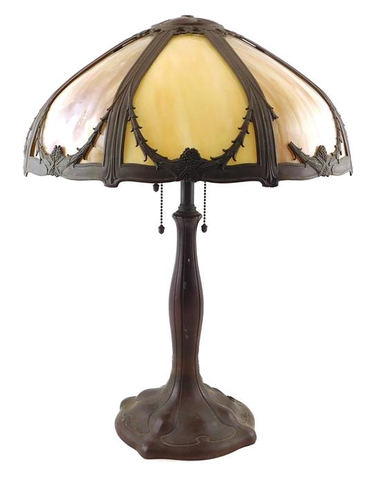 Appraisal: LIGHTING Art Nouveau unsigned -light table lamp domed eight-paneled caramel