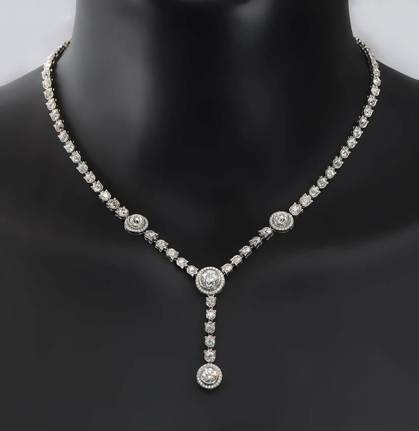 Appraisal: MAGNIFICENT PLATINUM CTW DIAMOND ''Y'' NECKLACE The four larger diamonds