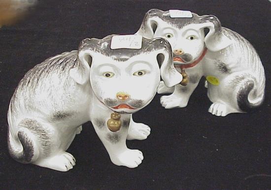 Appraisal: Pair of Chinese Export style porcelain figures of dogs h