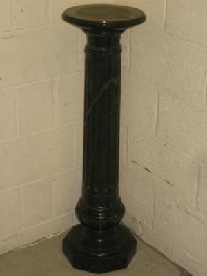 Appraisal: A GREEN MARBLE PEDESTAL of columnar form the circular top