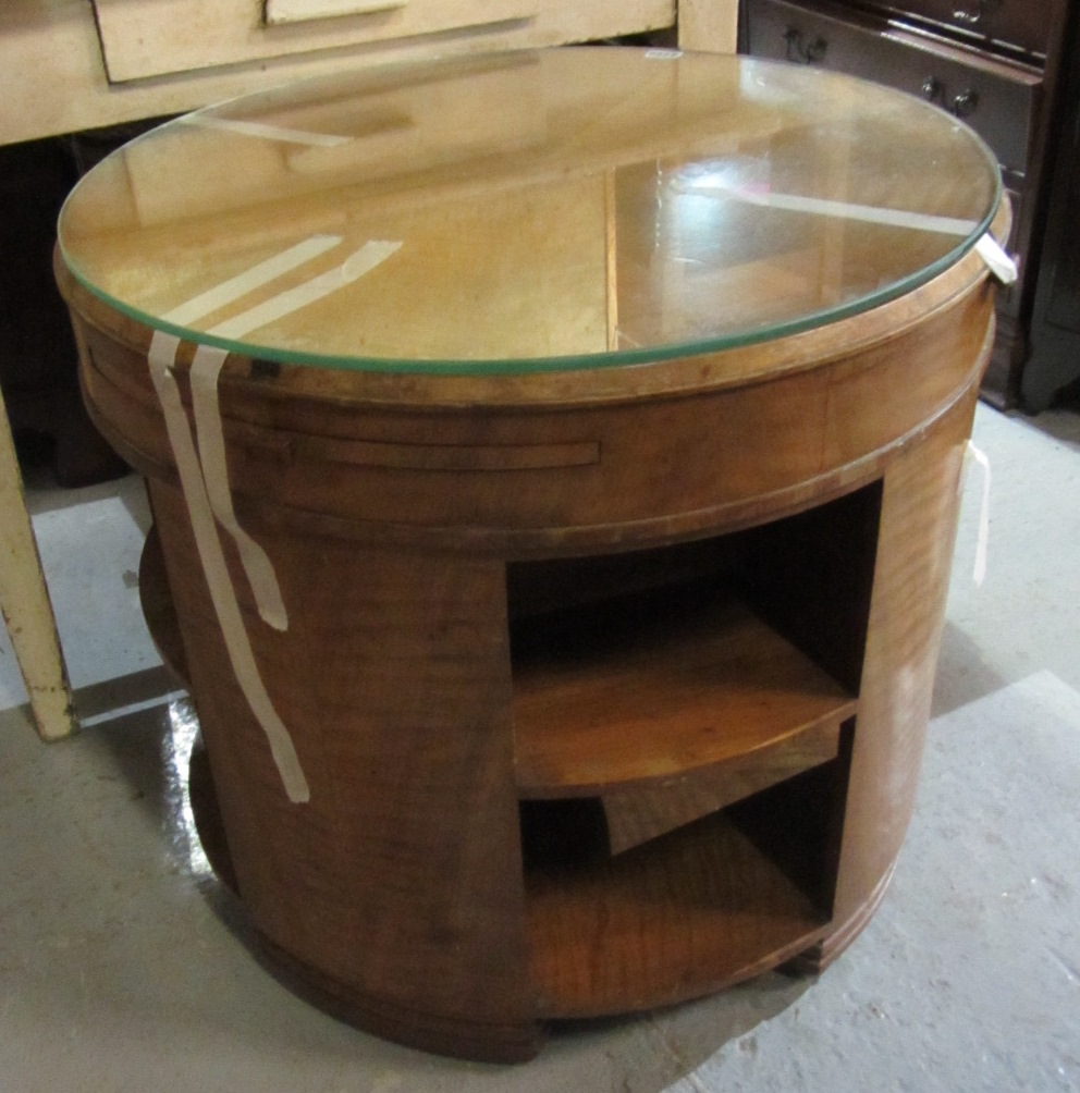 Appraisal: A th century circular satinwood occasional table