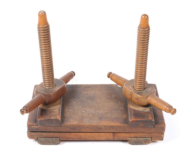 Appraisal: AN ANTIQUE FRUITWOOD DOUBLE SCREW BOOK PRESS with turned handles