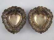 Appraisal: A pair of late Victorian pierced silver heart shaped bonbon