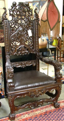 Appraisal: MONUMENTAL CARVED MAHOGANY PALACE ARMCHAIR English Charles II style having