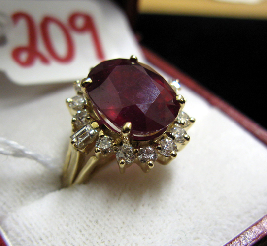 Appraisal: RUBY DIAMOND AND FOURTEEN KARAT GOLD RING centered and prong