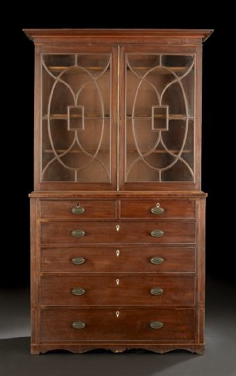 Appraisal: George III-Style Mahogany Bookcase-on-Chest mid- th century the molded overhanging