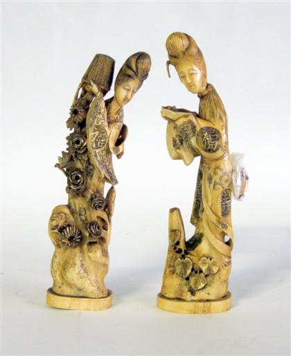 Appraisal: Pair of Japanese carved bone figures of womenEach carved as