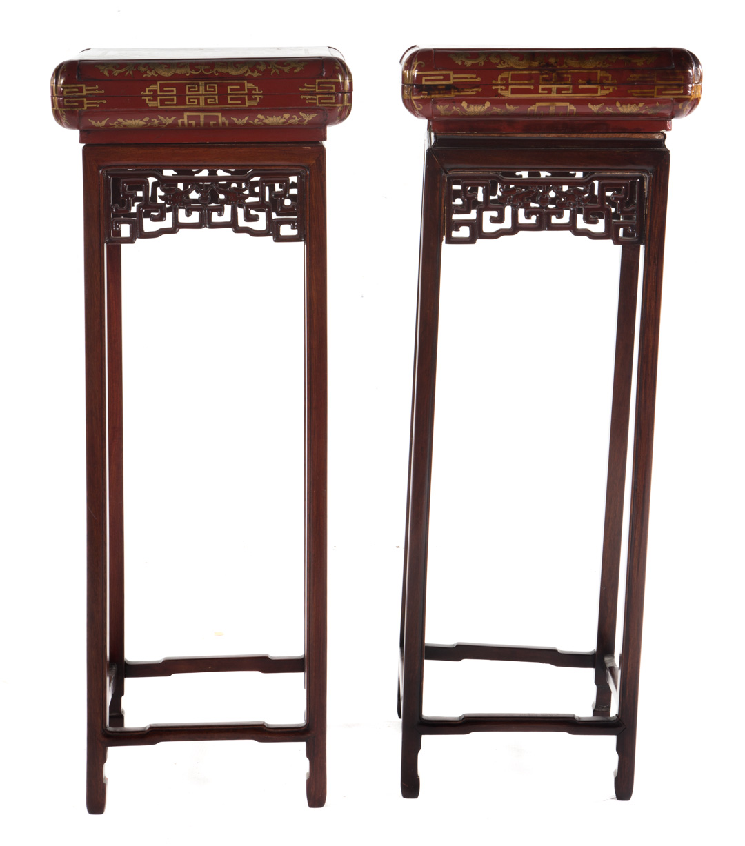 Appraisal: Pair of Chinese carved and painted fern stands red ground