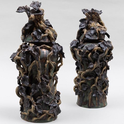 Appraisal: PAIR OF MATTHEW SOLOMON GLAZED CERAMIC VASES AND COVERS WITH