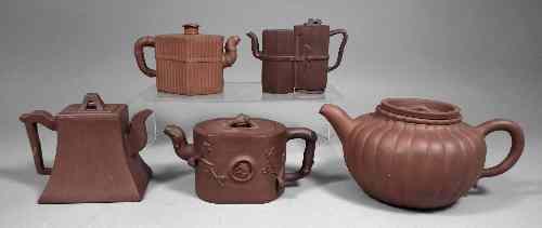 Appraisal: A collection of five th Century Chinese redware pottery teapots