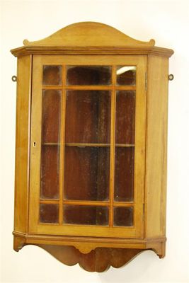 Appraisal: An Edwardian mahogany and line inlaid hanging corner cupboard with