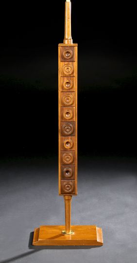 Appraisal: French Modernist Brass-Mounted Boss-Carved Fruitwood Floor Lamp the tall narrow