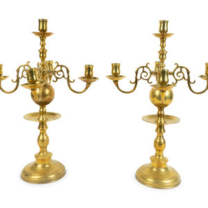 Appraisal: A Pair of Brass Five-Light Candelabra TH CENTURY solid cast