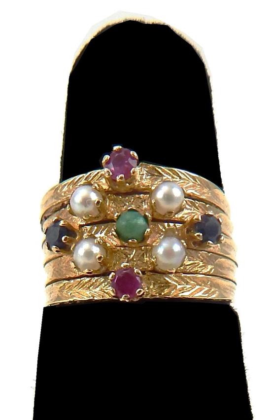 Appraisal: JEWELRY K yellow gold multi-gemstone ring comprised of five soldered