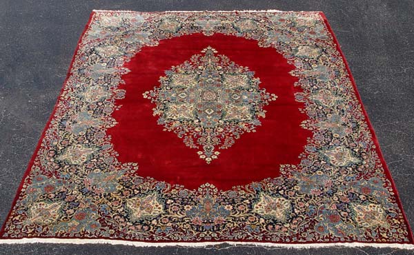 Appraisal: FINE ESTATE PERSIAN CARPET DEEP RED GROUND Approx ' ''