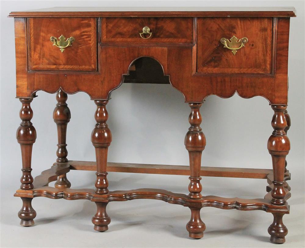 Appraisal: WILLIAM AND MARY STYLE WALNUT DRESSING TABLE having a rectangular