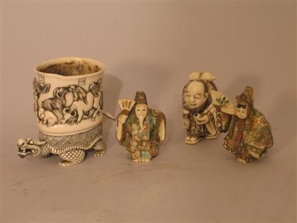 Appraisal: Group of Ivory Carvings Japanese -Hunchback with pipe and scroll