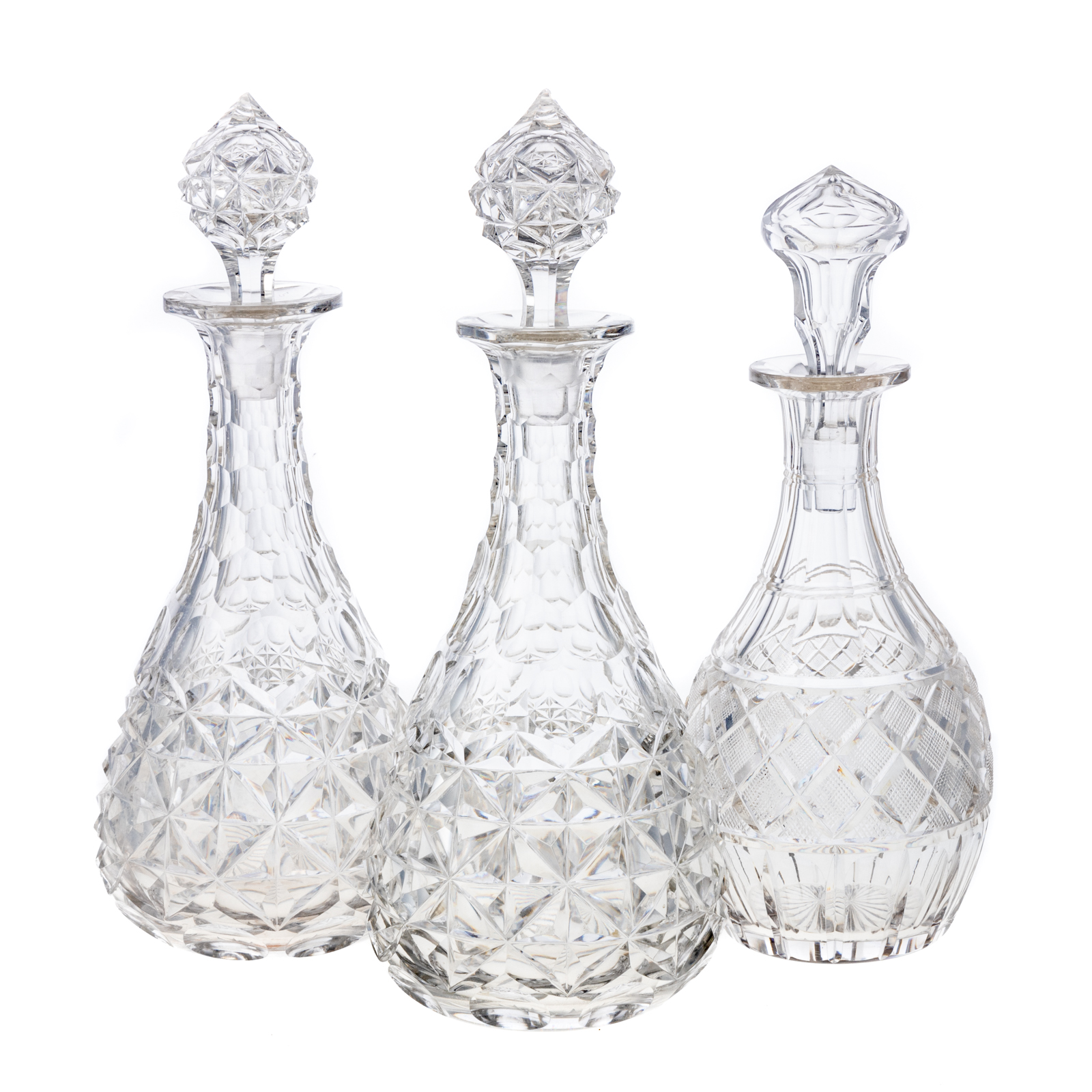 Appraisal: THREE ANGLO IRISH CUT GLASS DECANTERS Includes a pair of