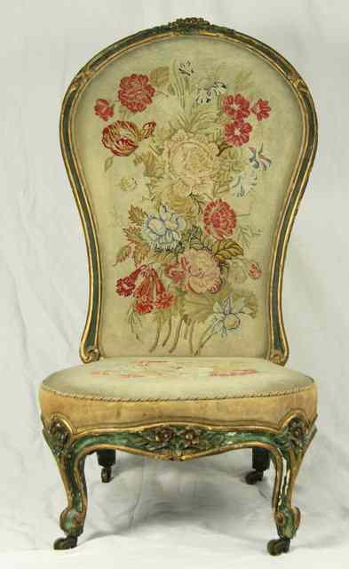 Appraisal: A Victorian nursing chair with gilded frame and needlework seat