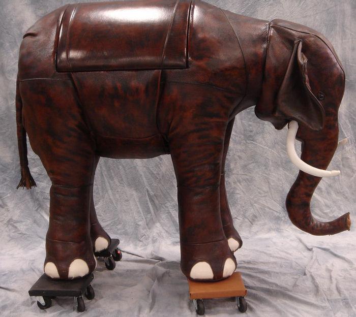 Appraisal: Leather elephant with bar compartment in body l h Estimate