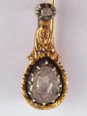 Appraisal: A Georgian rose cut diamond cravat pin possibly commemorating the