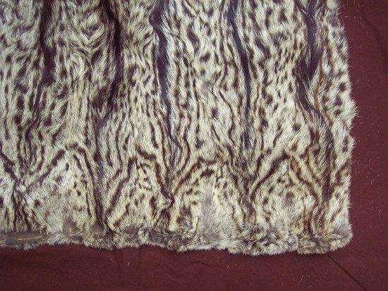 Appraisal: A fur rug mounted cm x cm x