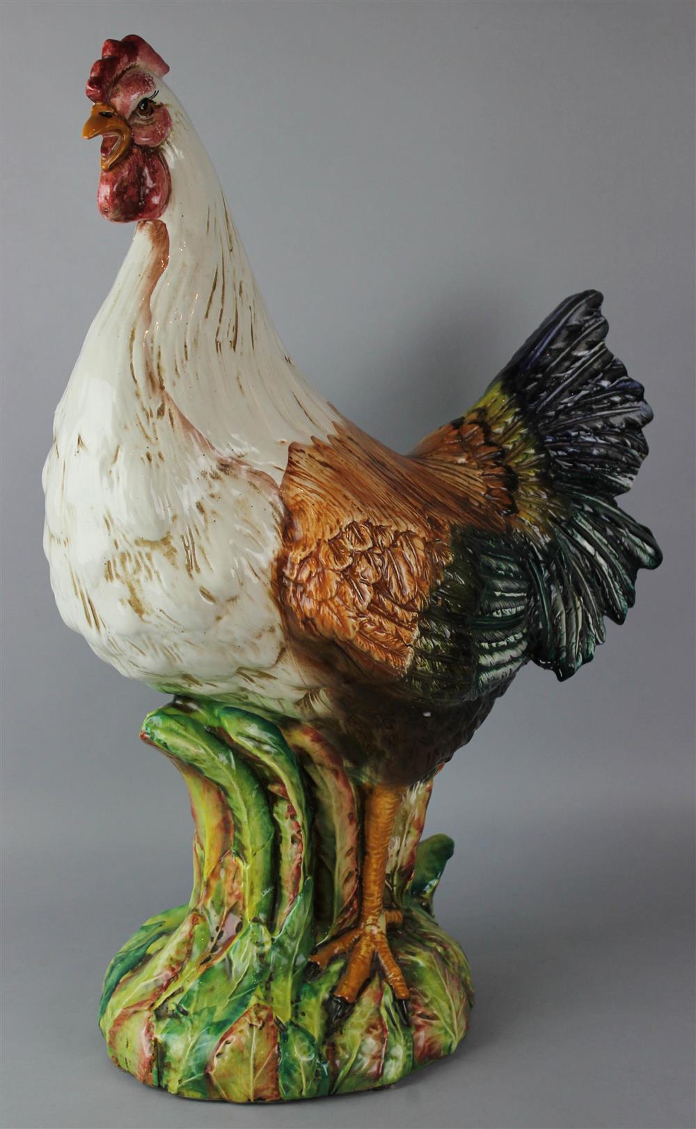 Appraisal: GLAZED TERRACOTTA MODEL OF A ROOSTER naturalistically modeled and colored