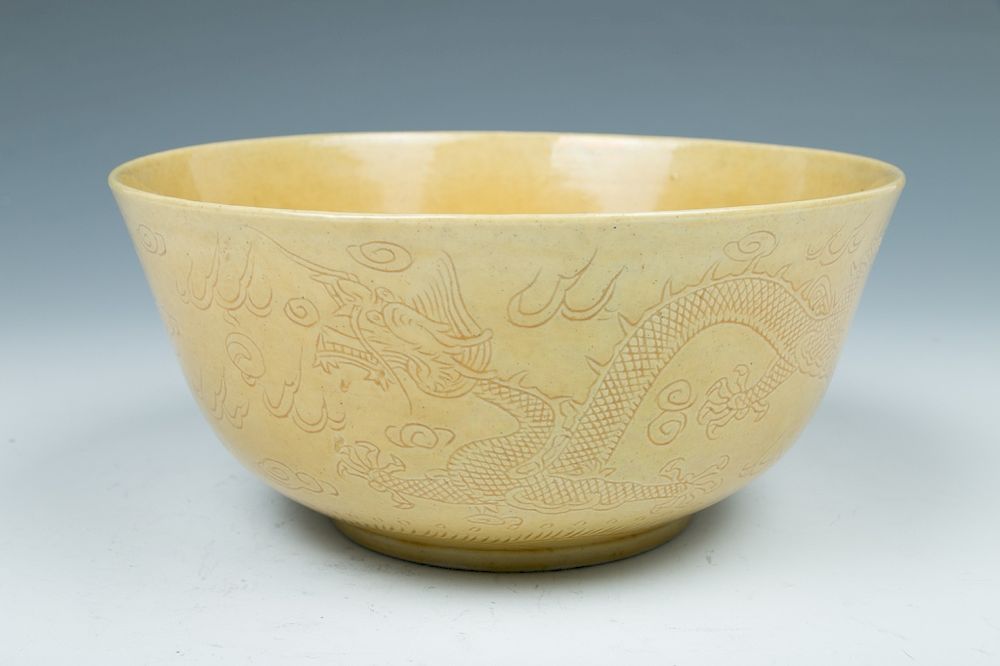 Appraisal: YELLOW GLAZE BOWL The bowl of globular form with a