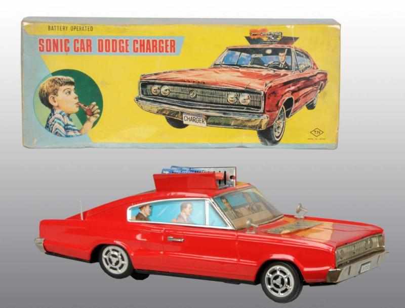 Appraisal: Tin Sonic Dodge Charger Battery-Op Toy Description Japanese Working Made