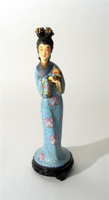 Appraisal: Chinese cloisonne enamel and stained ivory female figureModeled standing in