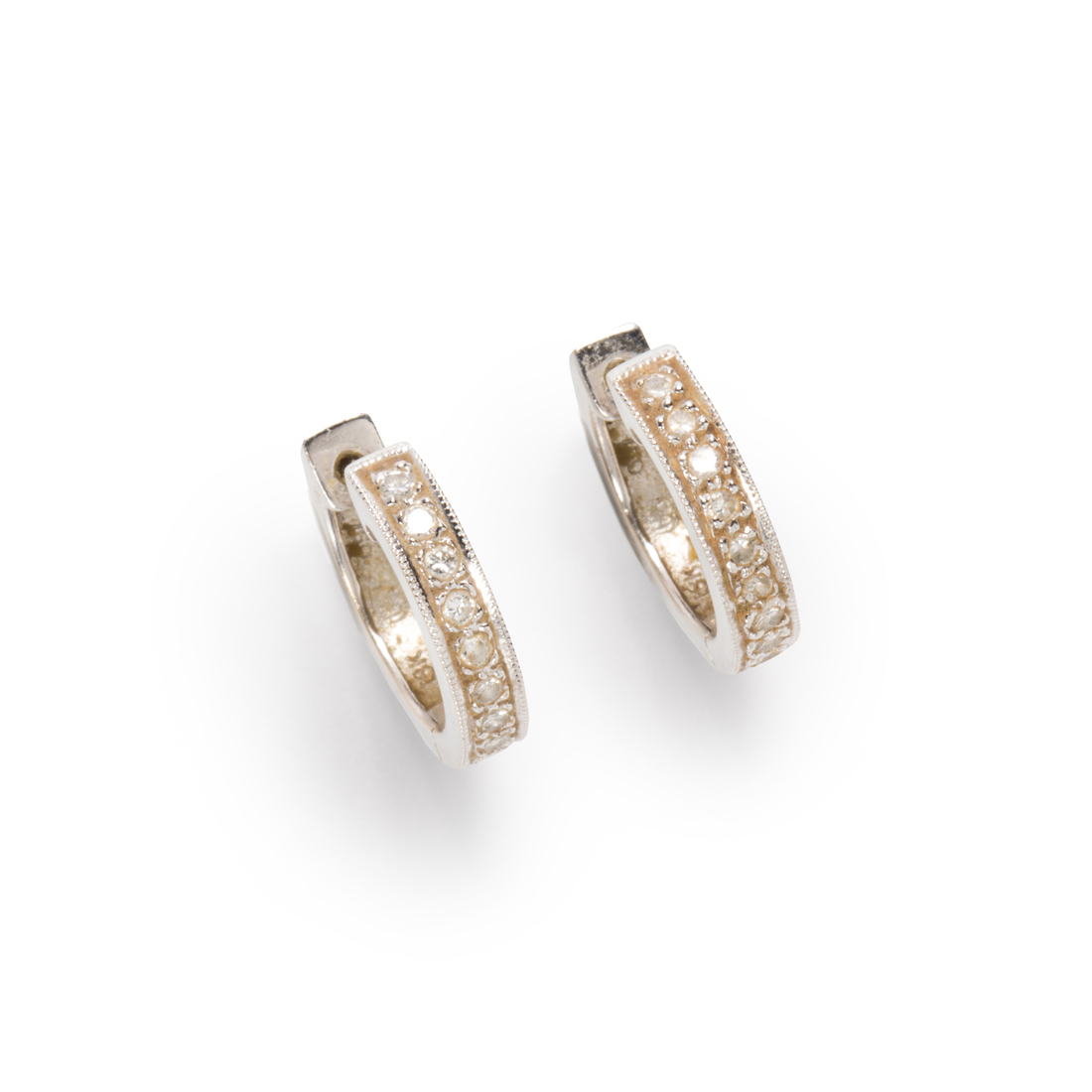 Appraisal: A PAIR OF DIAMOND AND EIGHTEEN KARAT WHITE GOLD EARRINGS