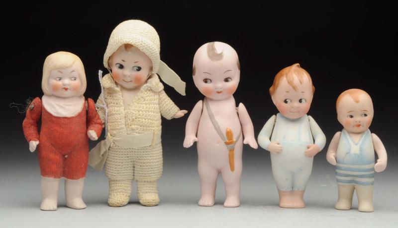 Appraisal: Lot Of All-Bisque Dolls Cupid with great original knitted outfit