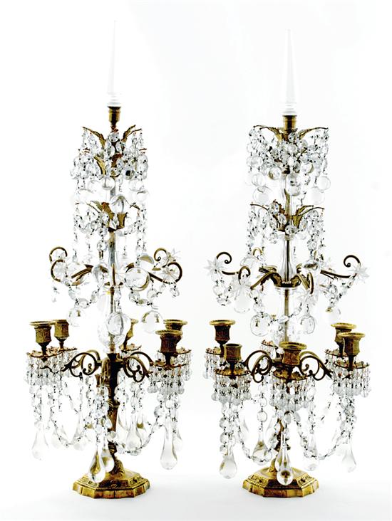 Appraisal: Brass and crystal nine-light candelabra ornamental crystal prism-draped brass candleholder