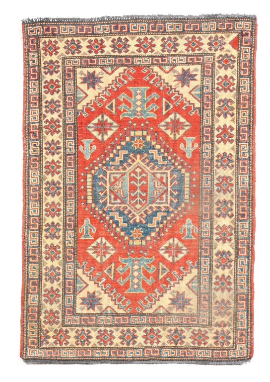 Appraisal: PAKISTAN KAZAK RUG Late th century Blue medallion on red