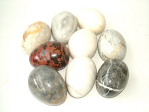 Appraisal: A collection of thirty polished egg shaped mineral specimens approx